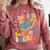 i Survived My Daughter's Bachelors Degree Groovy Graduation Comfort Colors Sweatshirt Crimson