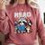 Animals Raccoon Reading Book Librarian Across America Kids Comfort Colors Sweatshirt Orchid