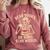 Read Books Be Kind Stay Weird Skeleton Reading Coffee Goth Comfort Colors Sweatshirt Orchid