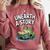 Unearth a Story Frog Reading a Book Summer 2026 Comfort Colors Sweatshirt Orchid