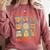 Women's DCC Many Faces Of Mordecai Grid Gamer Series Book Comfort Colors Sweatshirt Orchid Women's DCC Many Faces Of Mordecai Grid Gamer Series Book Comfort Colors Sweatshirt Orchid