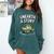 Unearth a Story Frog Reading a Book Summer 2026 Comfort Colors Sweatshirt Chalky Mint