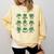 Cute Shamrock Reading Books St Patrick's Day Teacher Reading Comfort Colors Sweatshirt Blue Spruce