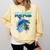 Frutiger Aero Splashy Dolphin Y2k Aesthetic Graphic Comfort Colors Sweatshirt Blue Spruce