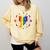 Rainbow Book With Stars And Moon Phases Gay Pride LGBT Comfort Colors Sweatshirt Blue Spruce