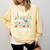 Proud Grandma Of a 2026 Graduate For Family Graduation Comfort Colors Sweatshirt Butter