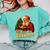 He Sees What You’Ve Been Reading Santa Book Lover Christmas Comfort Colors Sweatshirt Butter