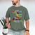 Pre k Graduation 2025 Pre-k Kindergarten Graduate Dinosaur Premium Tri-Blend Men's Comfort Colors T-Shirt Moss