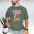 Unearth A Story Rainbow Treasure Book Men's Comfort Colors T-Shirt Moss