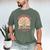 Women's Unearth a Story 2026 Summer Reading Program Flowers Book Men's Comfort Colors T-Shirt Moss