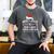 Most Likely To Read A Book Through Christmas Xmas Men's Comfort Colors T-Shirt Pepper