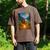 Bigfoot And Alien Reading Books Campfire Halloween Men's Comfort Colors T-Shirt Espresso Bigfoot And Alien Reading Books Campfire Halloween Men's Comfort Colors T-Shirt Espresso
