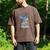 A Book A Day Keeps Reality Away Premium Tri-Blend Men's Comfort Colors T-Shirt Espresso