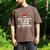 Most Likely To Read A Book On Christmas Matching Family Men's Comfort Colors T-Shirt Espresso