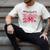 HUGvyn One Loved Teacher Valentine Book Heart Reading Bow Men's Comfort Colors T-Shirt Ivory