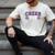 Proud Cheer Dad My Favorite Cheerleader Calls Me Dad Purple Men's Comfort Colors T-Shirt Ivory