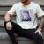 Trex Reading Book Dinosaur Men's Comfort Colors T-Shirt Ivory Trex Reading Book Dinosaur Men's Comfort Colors T-Shirt Ivory