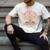 Unearth a Story 2026 Summer Reading Program Flowers Book Premium Tri-Blend Men's Comfort Colors T-Shirt Ivory