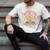 Women's Unearth a Story 2026 Summer Reading Program Flowers Book Men's Comfort Colors T-Shirt Ivory