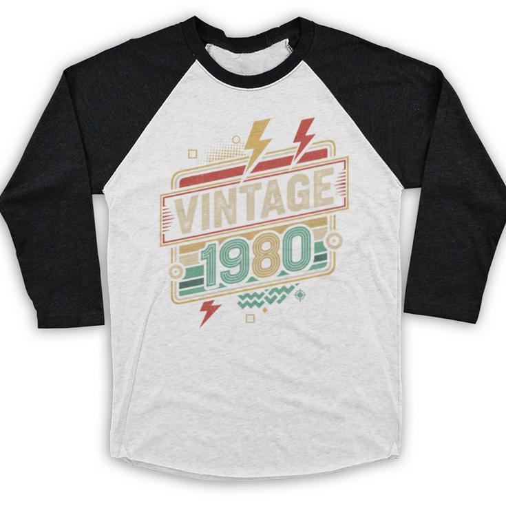 Vintage 1980 Retro Badge Decade Nostalgia Graphic Emblem Premium Tri-Blend Baseball Raglan Shirt