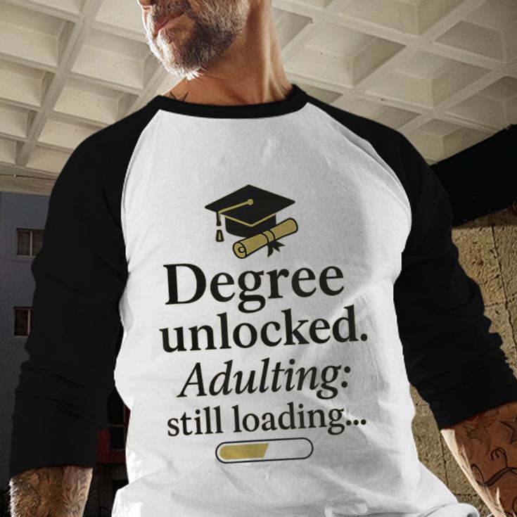 Graduation 2025 Degree Unlocked Adulting Still Loading Baseball Raglan Shirt