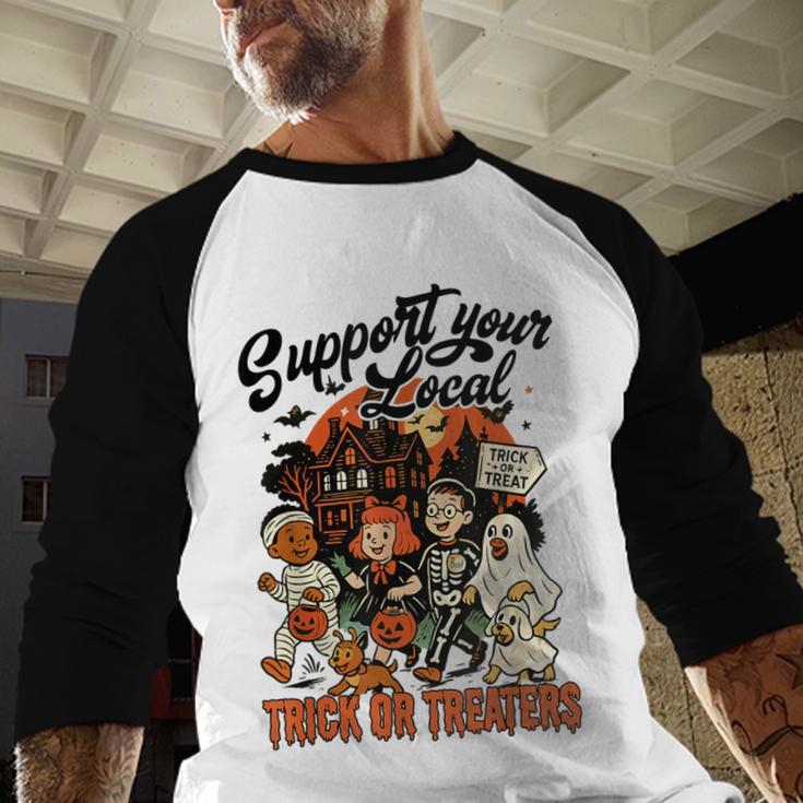 Support Your Local Trick Or Treaters Retro Spooky Nostalgia Baseball Raglan Shirt