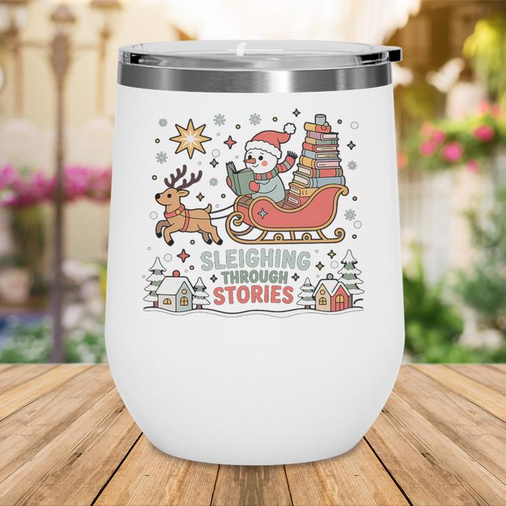 Book Lovers Winter Sleighing Through Stories Tee Premium Tri-Blend Wine Tumbler
