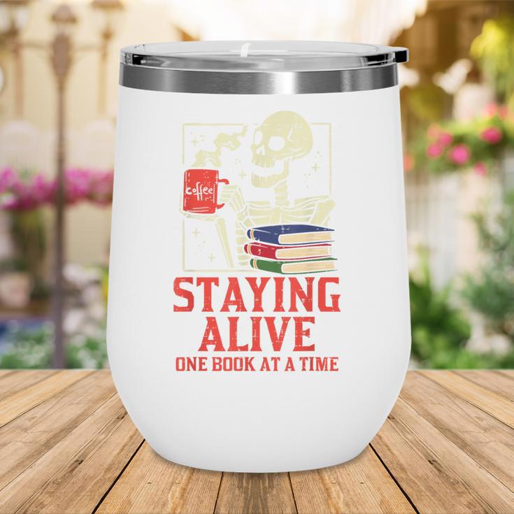 Staying Alive One Book At A Time Skeleton Reading Librarian Wine Tumbler Staying Alive One Book At A Time Skeleton Reading Librarian Wine Tumbler