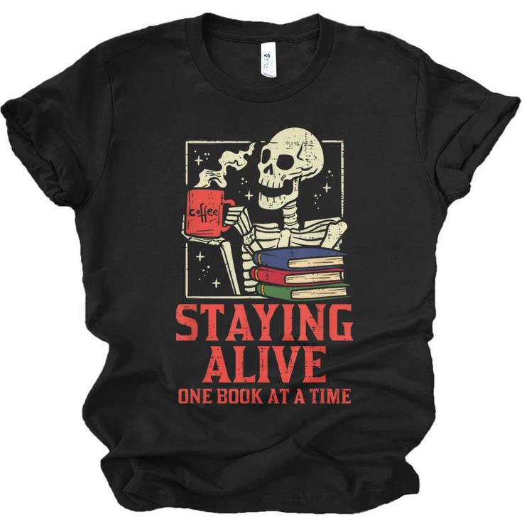 Staying Alive One Book At A Time Skeleton Reading Librarian Unisex Jersey T-Shirt