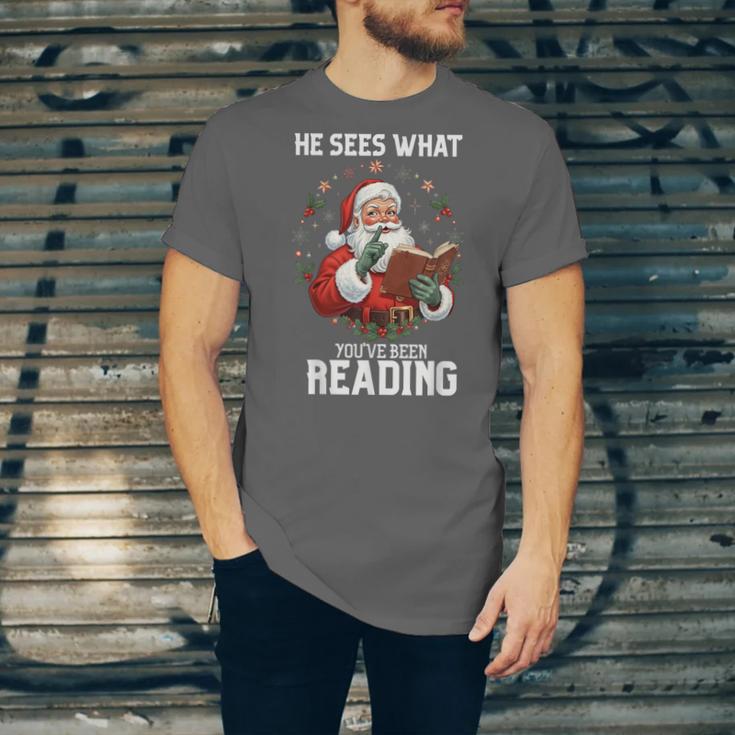 He Sees What You'Ve Been Reading Santa Book Lover Unisex Jersey T-Shirt