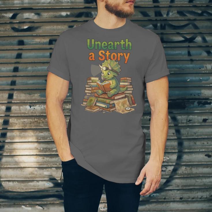 Unearth a Story Triceratops Dinosaur Reading Books Cute Dino Unisex Jersey T-Shirt Unearth a Story Triceratops Dinosaur Reading Books Cute Dino Unisex Jersey T-Shirt