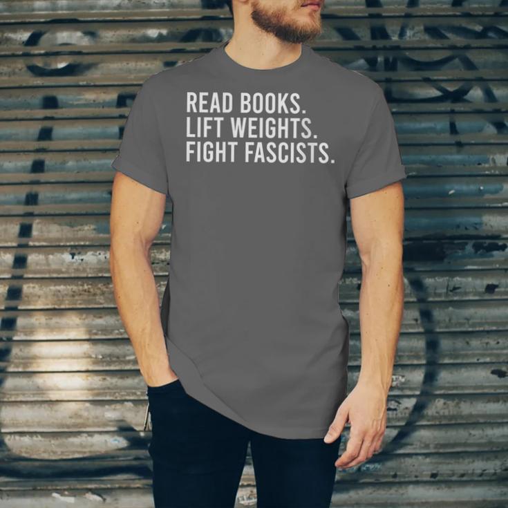 Women's Read Books Lift Weights Fight Fascists Reading Activism Unisex Jersey T-Shirt Women's Read Books Lift Weights Fight Fascists Reading Activism Unisex Jersey T-Shirt