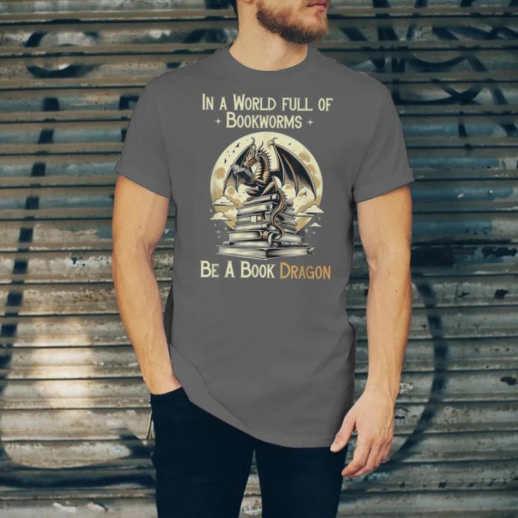 In a World Full Of Bookworms Be a Book Dragon Books Reading Unisex Jersey T-Shirt