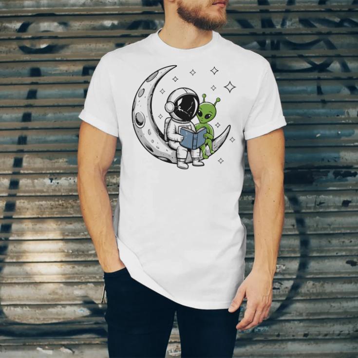 Astronaut Reading Book To Alien Moon Space Astronomy Unisex Jersey T-Shirt