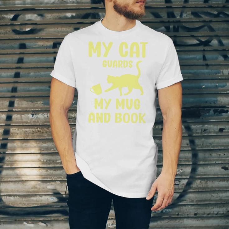 My Cat Guards My Mug And Book Humor Cats Premium Tri-Blend Unisex Jersey T-Shirt My Cat Guards My Mug And Book Humor Cats Premium Tri-Blend Unisex Jersey T-Shirt