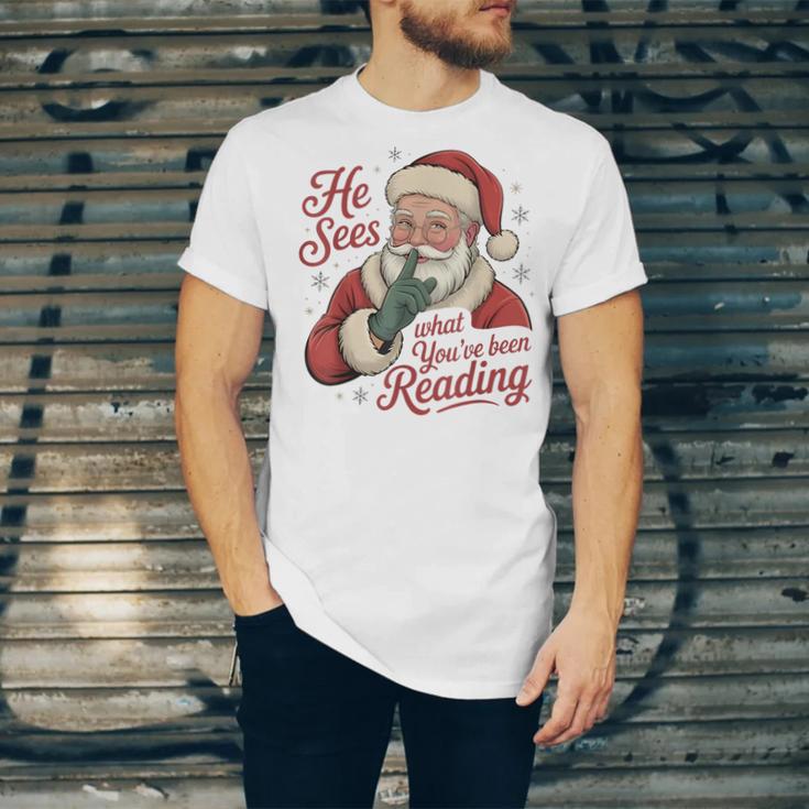 He Sees What You'Ve Been Reading Bookish Christmas Humor Unisex Jersey T-Shirt He Sees What You'Ve Been Reading Bookish Christmas Humor Unisex Jersey T-Shirt