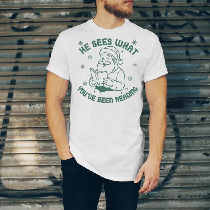He Sees What You'Ve Been Reading Christmas Bookish Santa Premium Tri-Blend Unisex Jersey T-Shirt He Sees What You'Ve Been Reading Christmas Bookish Santa Premium Tri-Blend Unisex Jersey T-Shirt