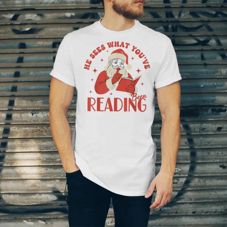 He Sees What You'Ve Been Reading Santa Book Unisex Jersey T-Shirt He Sees What You'Ve Been Reading Santa Book Unisex Jersey T-Shirt