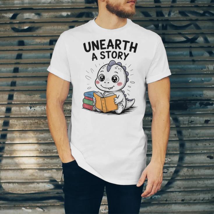 Unearth a Story Cute Dinosaur Summer Reading 2026 Dino Book Unisex Jersey T-Shirt