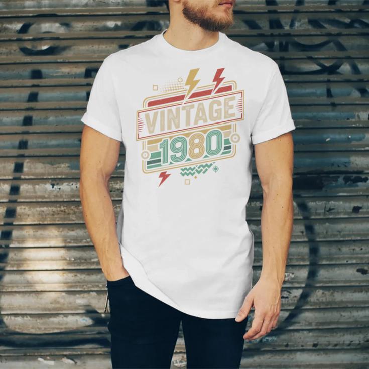 Vintage 1980 Retro Badge Decade Nostalgia Graphic Emblem Premium Tri-Blend Unisex Jersey T-Shirt