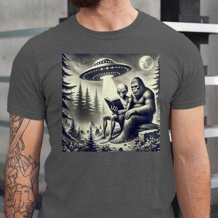Bigfoot With Alien Reading A Book Bigfoot And UFO Unisex Jersey T-Shirt Bigfoot With Alien Reading A Book Bigfoot And UFO Unisex Jersey T-Shirt