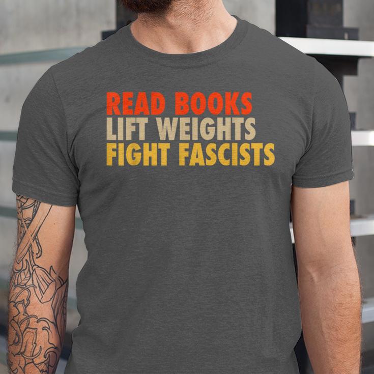 Read Books Lift Weights Fight Fascists Reading Humor Unisex Jersey T-Shirt Read Books Lift Weights Fight Fascists Reading Humor Unisex Jersey T-Shirt