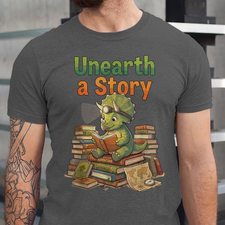 Unearth a Story Triceratops Dinosaur Reading Books Cute Dino Unisex Jersey T-Shirt Unearth a Story Triceratops Dinosaur Reading Books Cute Dino Unisex Jersey T-Shirt
