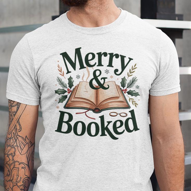 Merry And Booked Holiday Reading Winter Book Lover Premium Tri-Blend Unisex Jersey T-Shirt