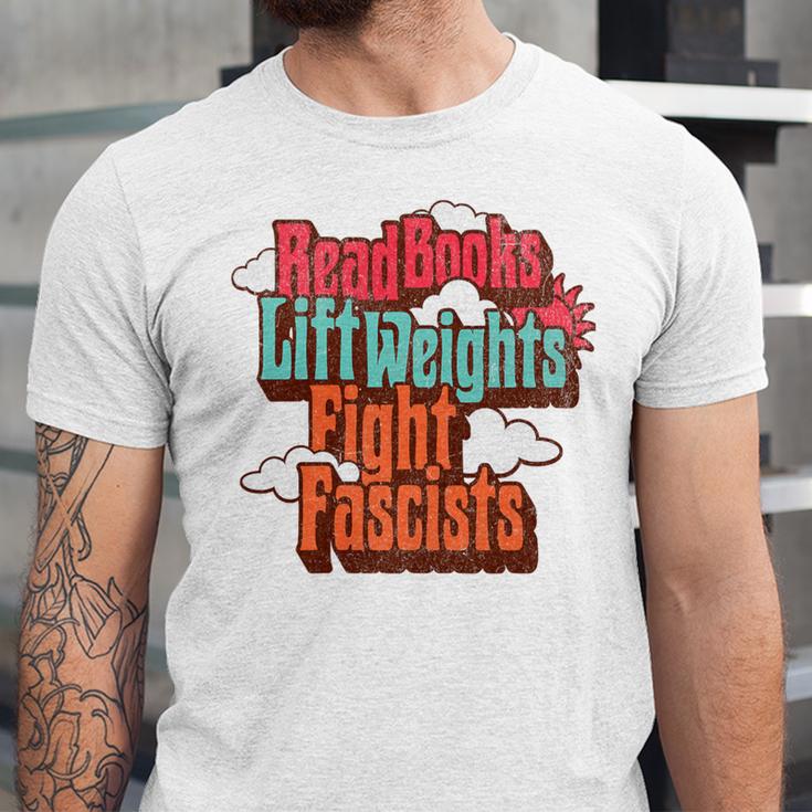Read Books Lift Weights Fight Fascists Reading No Kings Premium Tri-Blend Unisex Jersey T-Shirt Read Books Lift Weights Fight Fascists Reading No Kings Premium Tri-Blend Unisex Jersey T-Shirt