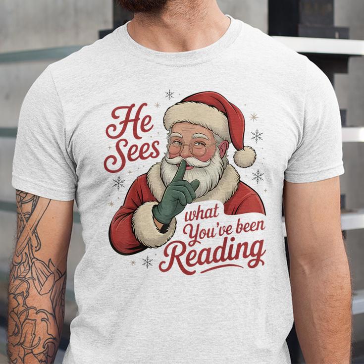 He Sees What You'Ve Been Reading Bookish Christmas Humor Unisex Jersey T-Shirt He Sees What You'Ve Been Reading Bookish Christmas Humor Unisex Jersey T-Shirt