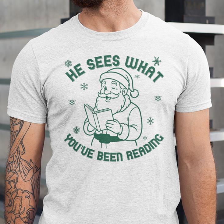 He Sees What You'Ve Been Reading Christmas Bookish Santa Premium Tri-Blend Unisex Jersey T-Shirt He Sees What You'Ve Been Reading Christmas Bookish Santa Premium Tri-Blend Unisex Jersey T-Shirt