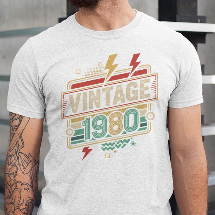 Vintage 1980 Retro Badge Decade Nostalgia Graphic Emblem Premium Tri-Blend Unisex Jersey T-Shirt