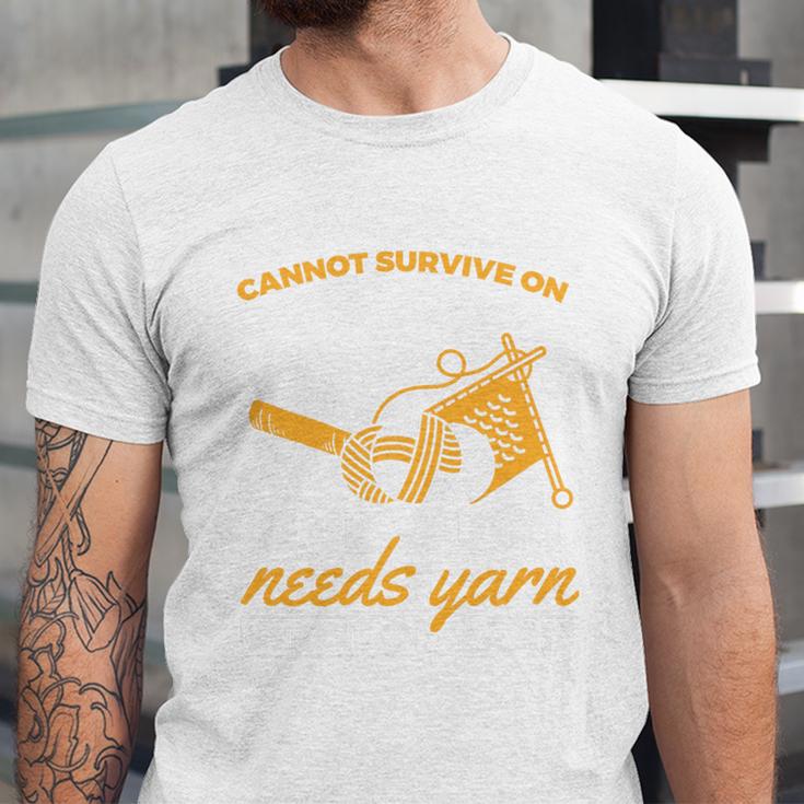 Woman Survives On Books Yarn Knitting Crochet Premium Tri-Blend Unisex Jersey T-Shirt Woman Survives On Books Yarn Knitting Crochet Premium Tri-Blend Unisex Jersey T-Shirt