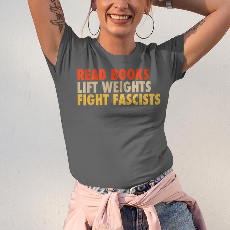 Read Books Lift Weights Fight Fascists Reading Humor Unisex Jersey T-Shirt Read Books Lift Weights Fight Fascists Reading Humor Unisex Jersey T-Shirt